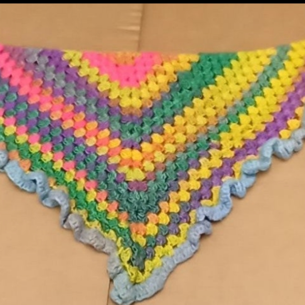A handmade child's shawl size 2 to 5